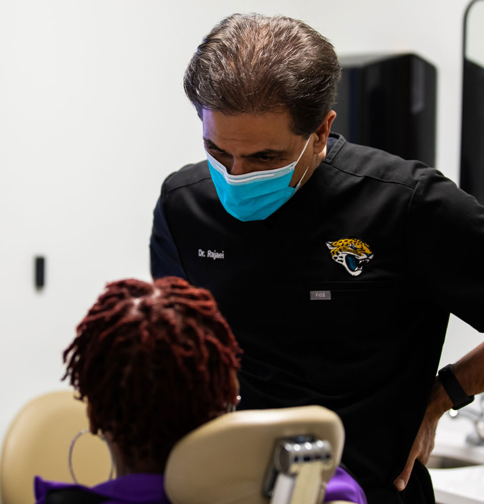 dentist talking to patient